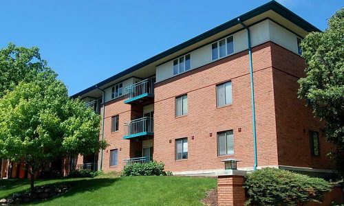Side of Building with Balcony and Windows