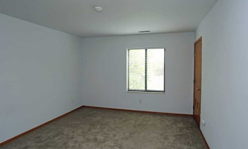 Carpeted Bedroom with Single Window